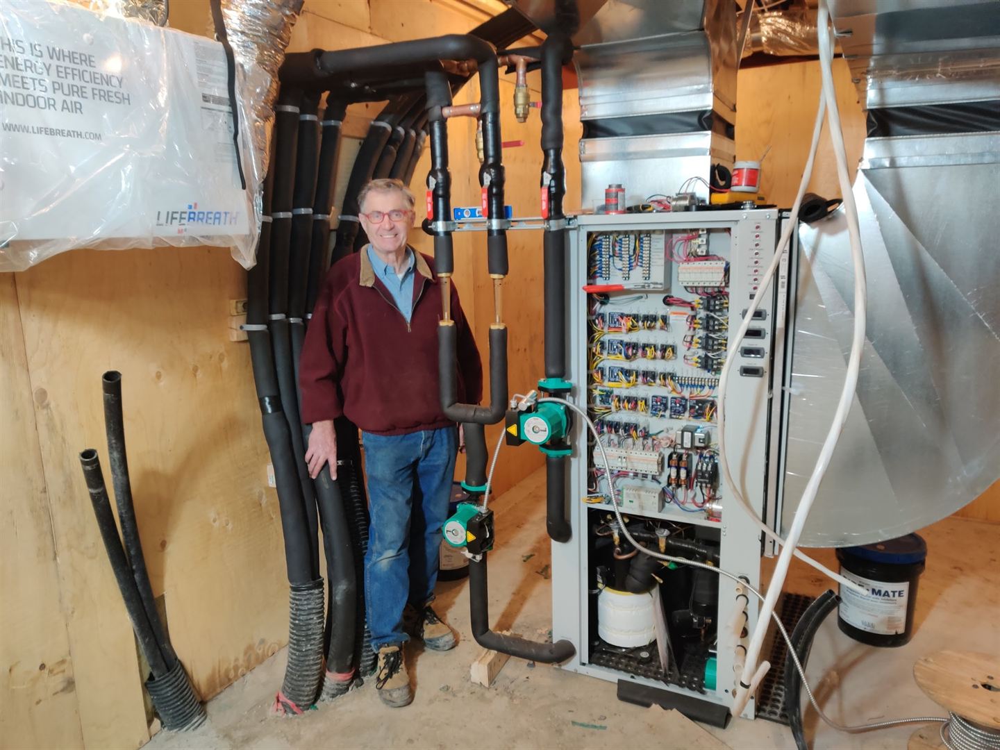 Equipment and insulated pipework across a plant room